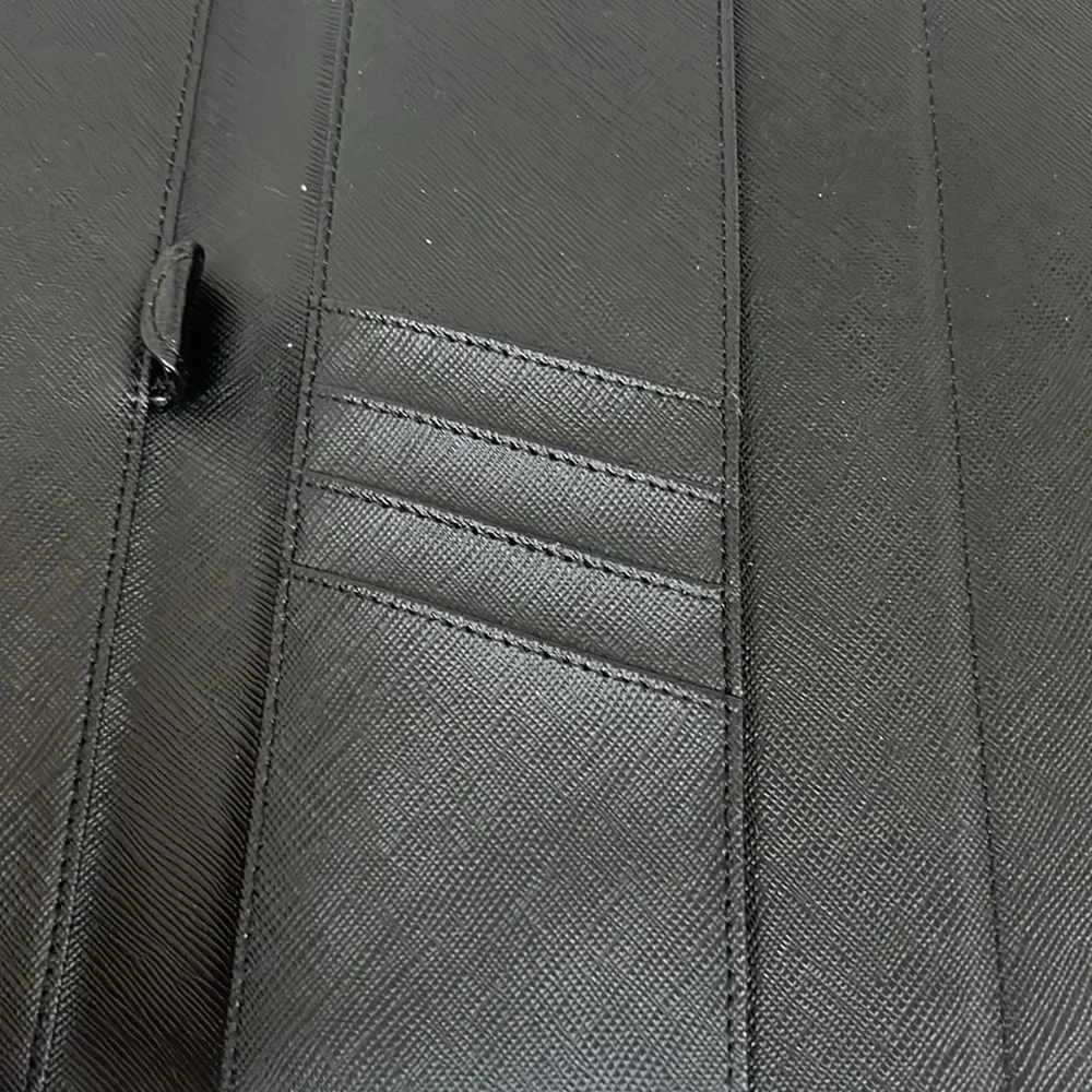 Michael Kors Tablet Case Black with card slots and pen holder.